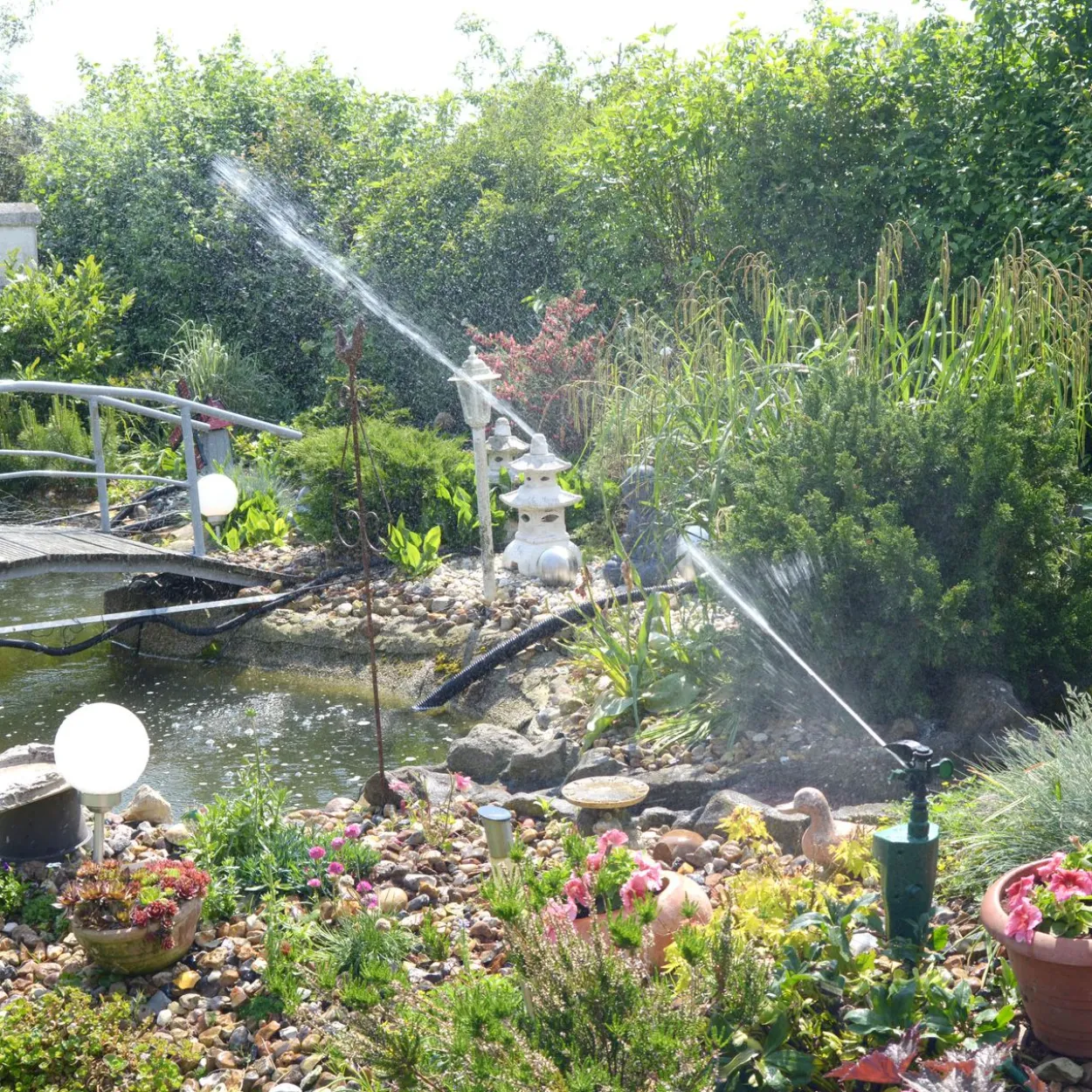 Gardigo Wasser-Tiervertreiber mit Tropfschutz